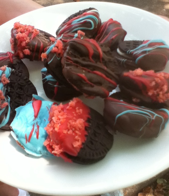  store bought gluten free sandwich cookies dipped in chocolate and sprinkled with pop rocks. 